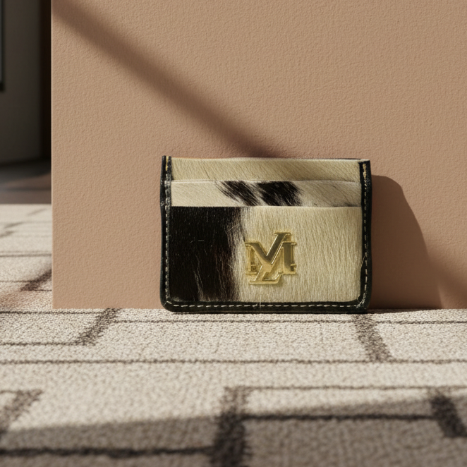 Cardholder with a logo on a surface with a neutral background