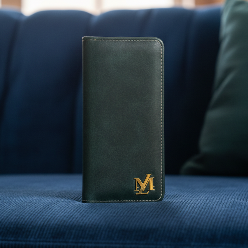 Green leather wallet with a logo on a blue couch